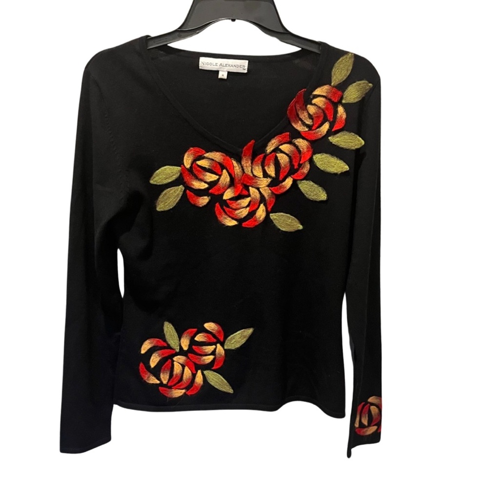 Nice sweater by Nicole Alexander.
